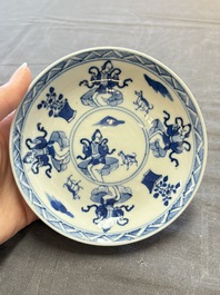 Five Chinese blue and white cups and saucers, Kangxi mark, 19th C.