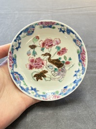 Three Chinese famille rose cups and saucers with a duck among flowering branches, Yongzheng/Qianlong