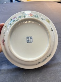 A Chinese famille rose plate with a bird and butterfly among blossoming branches, Yongzheng mark, Republic