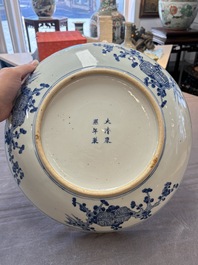 A Chinese blue and white 'Sanxing' dish, Kangxi mark, 19th C.