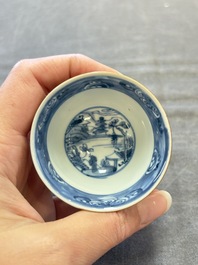 Four Chinese blue and white capucin-ground cups and saucers with landscape design, Yongzheng