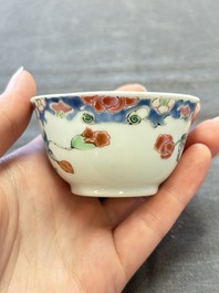 Three Chinese famille rose cups and saucers with a duck among flowering branches, Yongzheng/Qianlong