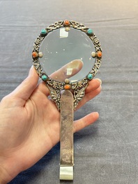 A Chinese silver-mounted magnifying glass with jade handle and precious stone inlays, 19th C.