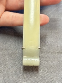 A Chinese silver-mounted magnifying glass with jade handle and precious stone inlays, 19th C.