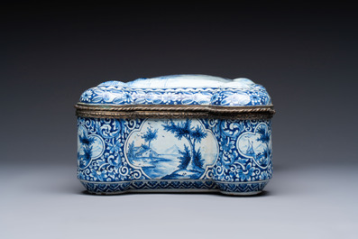 A blue and white Dutch Delft bronze-mounted casket, 19th C.