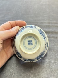 Five Chinese blue and white cups and saucers, Kangxi mark, 19th C.