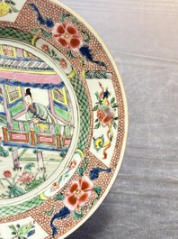 A pair of Chinese famille rose plates with figural design, Yongzheng/Qianlong