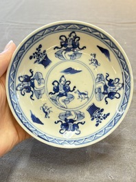 Five Chinese blue and white cups and saucers, Kangxi mark, 19th C.