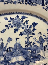 A Chinese blue and white 'ladies in a garden' serving dish, Qianlong