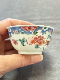 Three Chinese famille rose cups and saucers with a duck among flowering branches, Yongzheng/Qianlong