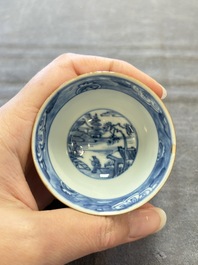 Four Chinese blue and white capucin-ground cups and saucers with landscape design, Yongzheng