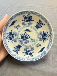 Five Chinese blue and white cups and saucers, Kangxi mark, 19th C.