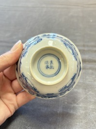 Five Chinese blue and white cups and saucers, Kangxi mark, 19th C.