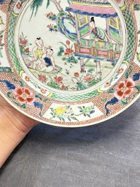 A pair of Chinese famille rose plates with figural design, Yongzheng/Qianlong