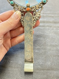 A Chinese silver-mounted magnifying glass with jade handle and precious stone inlays, 19th C.