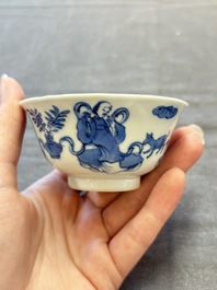 Five Chinese blue and white cups and saucers, Kangxi mark, 19th C.