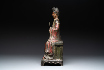 A large Chinese polychrome-lacquered and gilt bronze Daoist immortal, 17th C.