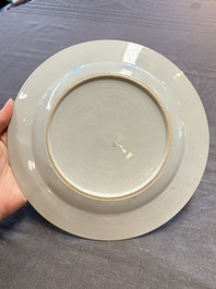 A pair of Chinese famille rose plates with figural design, Yongzheng/Qianlong
