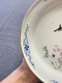 A Chinese famille rose plate with a bird and butterfly among blossoming branches, Yongzheng mark, Republic