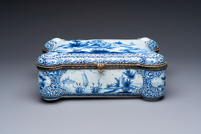 A blue and white Dutch Delft bronze-mounted casket, 19th C.