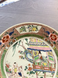 A pair of Chinese famille rose plates with figural design, Yongzheng/Qianlong