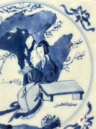 A Chinese blue and white 'elegant beauty and boy' tile, Kangxi