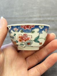 Three Chinese famille rose cups and saucers with a duck among flowering branches, Yongzheng/Qianlong