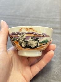 A set of four Chinese famille rose cups and saucers with horses, Qianlong