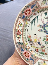A Chinese famille rose plate with figural design, Yongzheng/Qianlong