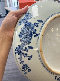 A Chinese blue and white 'Sanxing' dish, Kangxi mark, 19th C.