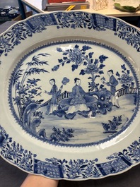 A Chinese blue and white 'ladies in a garden' serving dish, Qianlong