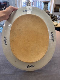 A Chinese blue and white 'ladies in a garden' serving dish, Qianlong