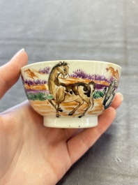 A set of four Chinese famille rose cups and saucers with horses, Qianlong
