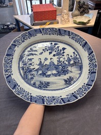 A Chinese blue and white 'ladies in a garden' serving dish, Qianlong