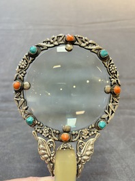 A Chinese silver-mounted magnifying glass with jade handle and precious stone inlays, 19th C.