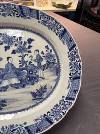 A Chinese blue and white 'ladies in a garden' serving dish, Qianlong