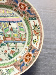 A pair of Chinese famille rose plates with figural design, Yongzheng/Qianlong