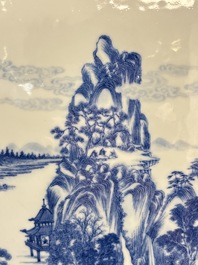 A Chinese blue and white 'mountainous landscape' plaque mounted in a wooden frame, 19/20th C.