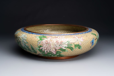 A large Chinese cloisonn&eacute; brush washer and a pair of gilt-lacquered covered boxes with cloisonn&eacute; plaques, 20th C.