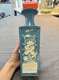 A Chinese robin's egg-glazed vase with relief floral design and a famille noire 'Four Heavenly Kings' vase, 19th C.