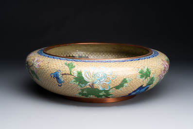 A large Chinese cloisonn&eacute; brush washer and a pair of gilt-lacquered covered boxes with cloisonn&eacute; plaques, 20th C.