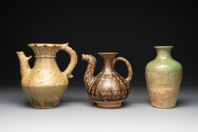 Two Chinese brown-glazed ewers and a celadon-glazed vase, one ewer dated 1571 with a Longqing mark, Qing and later