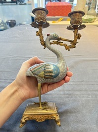 A pair of Chinese cloisonn&eacute; cranes, later mounted as candelabras, 19th C.