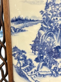A Chinese blue and white 'mountainous landscape' plaque mounted in a wooden frame, 19/20th C.