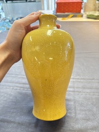 A Chinese yellow-glazed 'meiping' vase with incised design, Kangxi mark, 19th C.