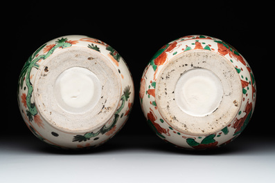 A Chinese sancai figure of Garuda, a cream-glazed vase and a pair of wucai jars, 19/20th C.