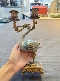 A pair of Chinese cloisonn&eacute; cranes, later mounted as candelabras, 19th C.