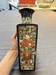 A Chinese robin's egg-glazed vase with relief floral design and a famille noire 'Four Heavenly Kings' vase, 19th C.