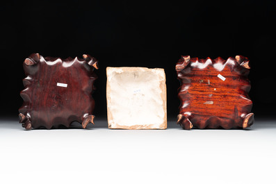 Three Chinese turquoise-glazed square 'gu' vases with floral design and two wooden stands, Ming