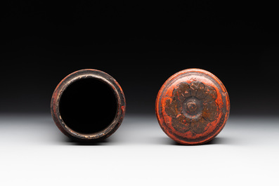 A Chinese cinnabar lacquer vase, a plate and a gilt-lacquered wooden container, 19/20th C.